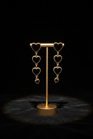 Azvera Studio Amour Drop Earrings featuring elegant gold-tone design with delicate hanging elements.
