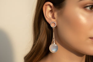 Silver Luna Drop Earrings by Azvera Studio featuring sleek, minimalist crescent moon design on a white background.