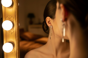Silver Arc Drop Earrings by Azvera Studio featuring sleek, curved design hanging from delicate hooks.