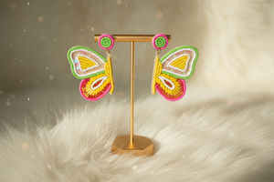 Azvera Studio Papillon Butterfly Earrings jewelry featuring delicate butterfly designs in silver with intricate detailing.