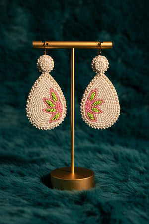 Beaded earrings from Azvera Studio featuring colorful, intricate beadwork in a stylish jewelry design.