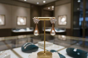 Close-up of the Pearl Aura Luxe necklace by Azvera Studio featuring luminous pearls and intricate silver detailing.